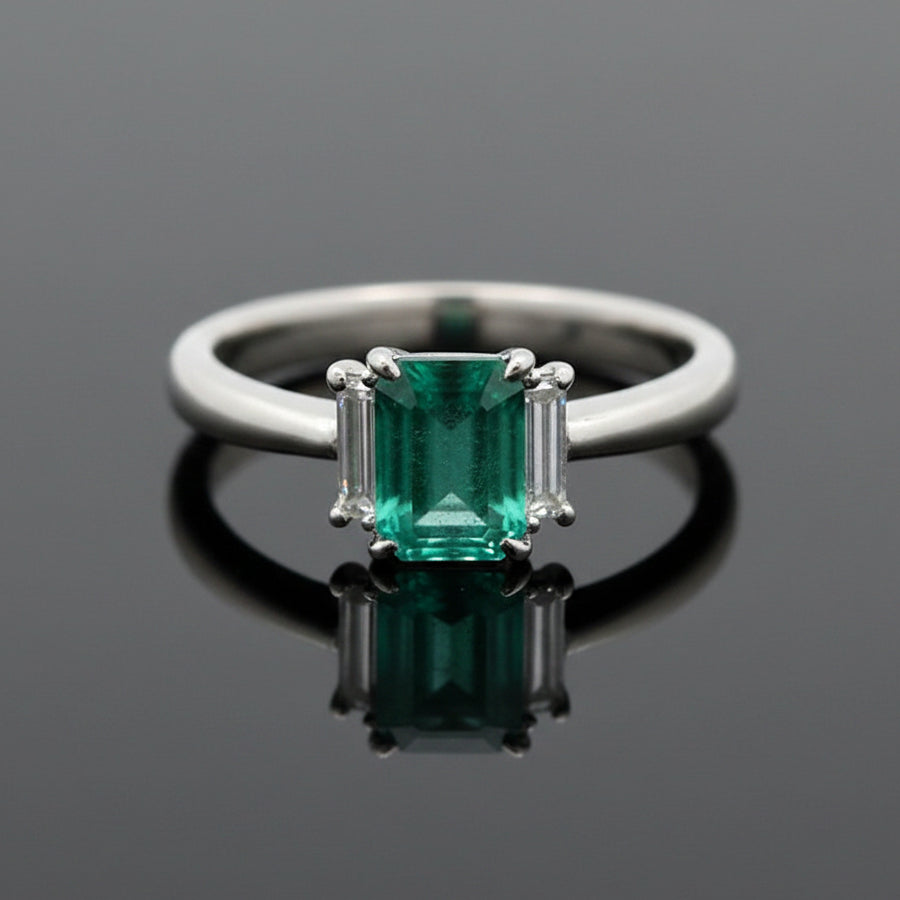 Modern Emerald and Diamond Platinum Ring